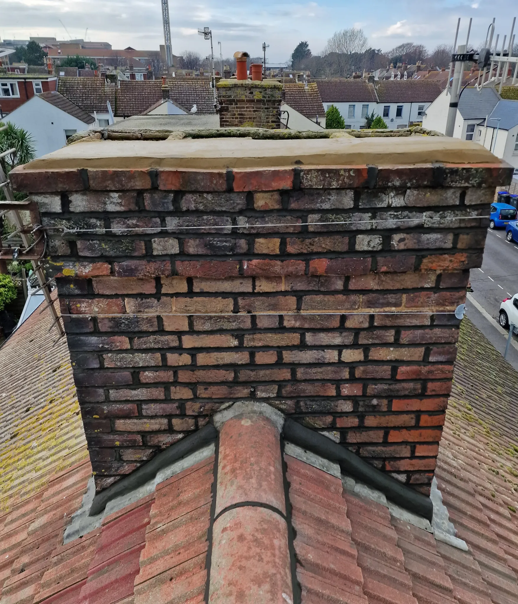 Southern Coastal Roofing chimney and surrounding roof tiles